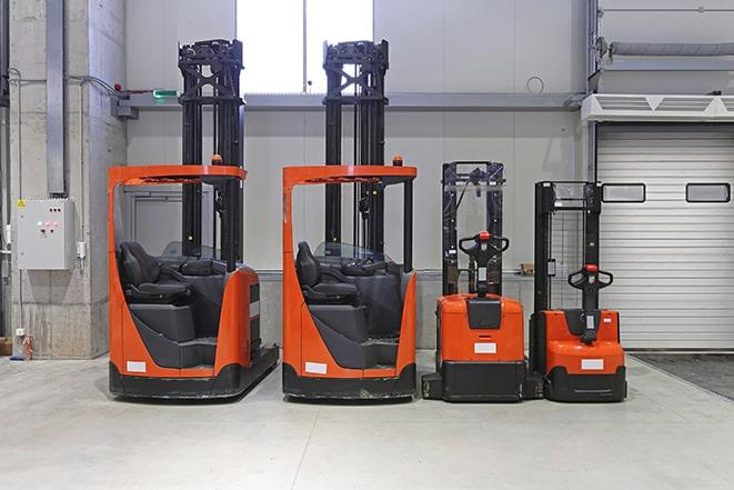 industrial forklifts in a storage facility